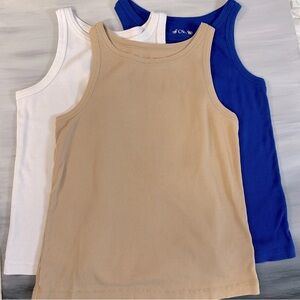 3 Women’s size medium tank tops. Royal blue, tan and white.